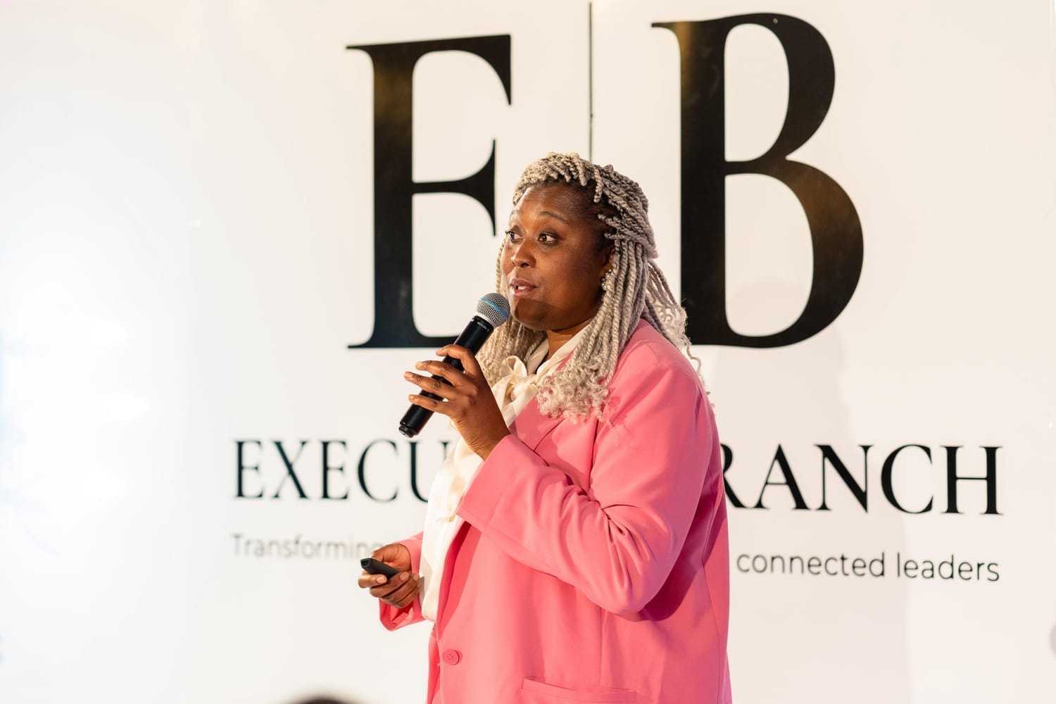 Rumbi Mutopo speaking on stage